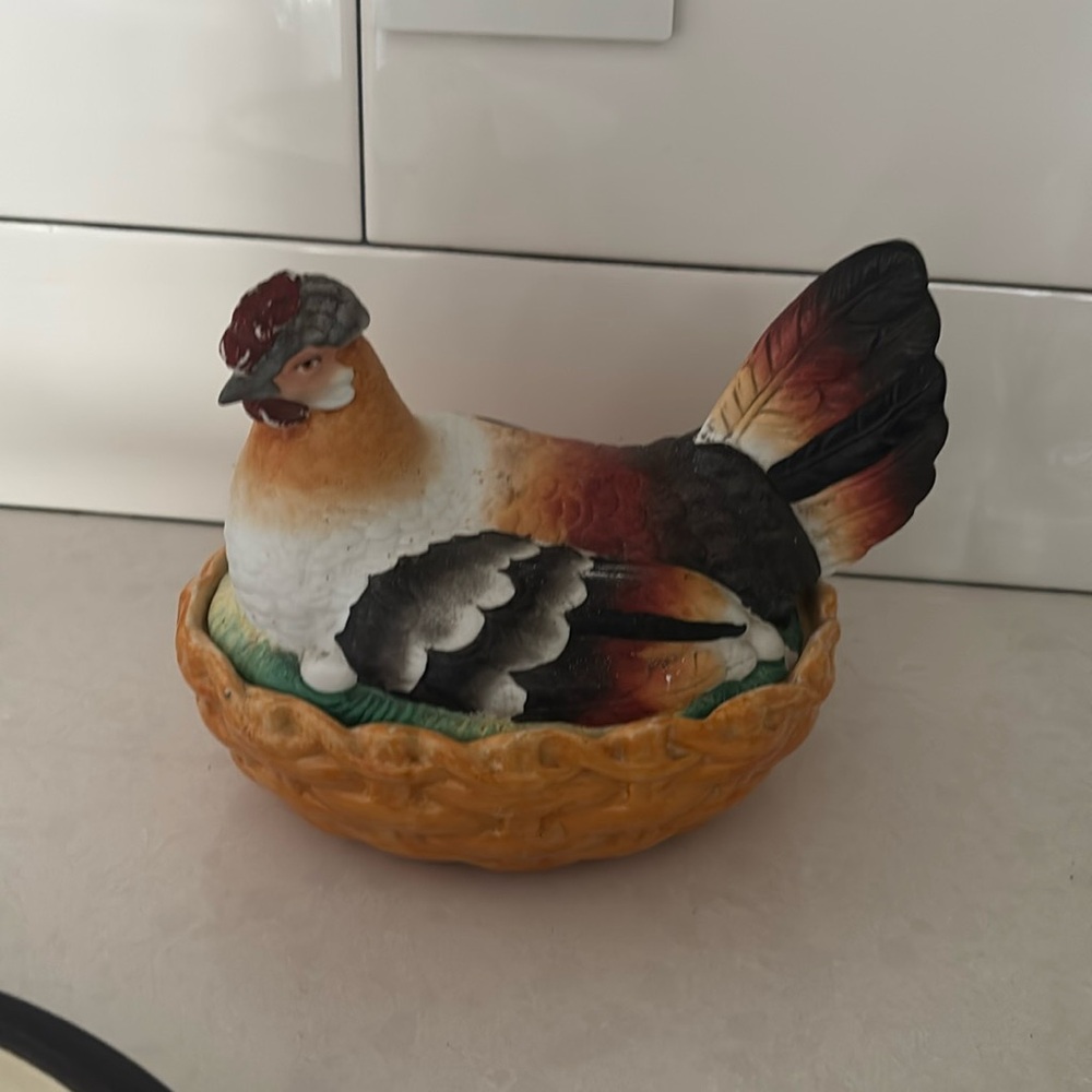 Staffordshire hen on a nest